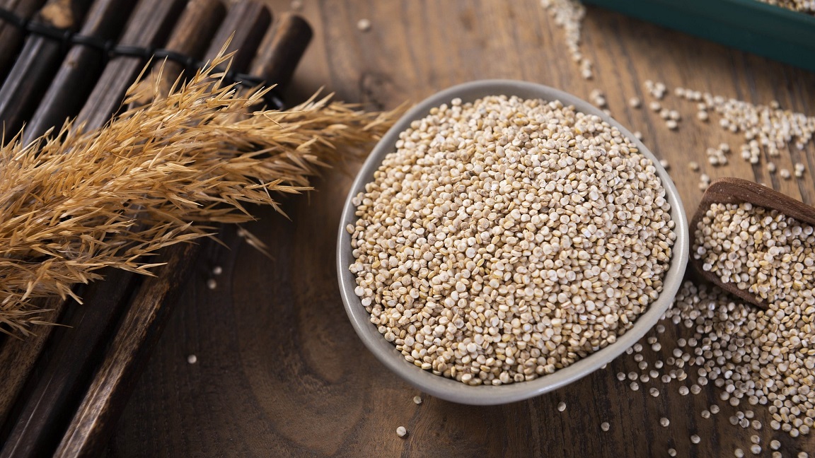 Raw white quinoa in a dish.